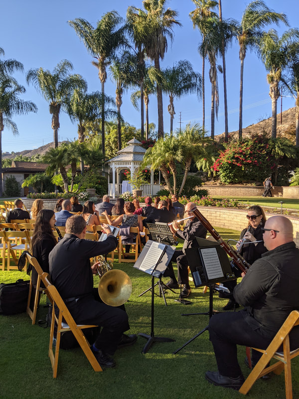 LCQ performs music while guests arrive at wedding at Singing Hills Golf Resort