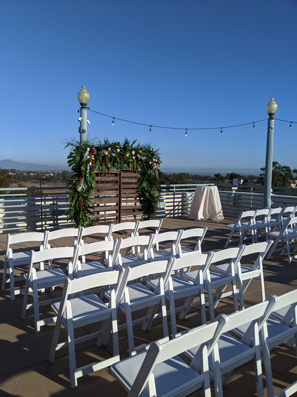 Wedding ceremony setup on the patio at the Natural History Museum San Diego