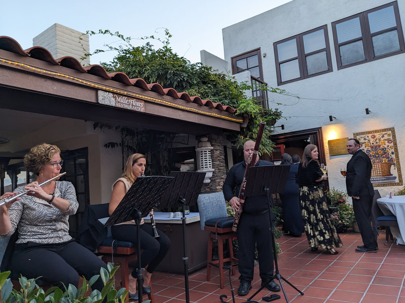 Left Coast Trio performs for wedding reception at Mille Fleurs